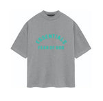 Load image into Gallery viewer, Fear of God Essentials Heavy Jersey S/S Tee Dark Heather Oatmeal
