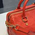 Load image into Gallery viewer, Louis Vuitton Empreinte Speedy Bandouliere 25 Orient (Like new)
