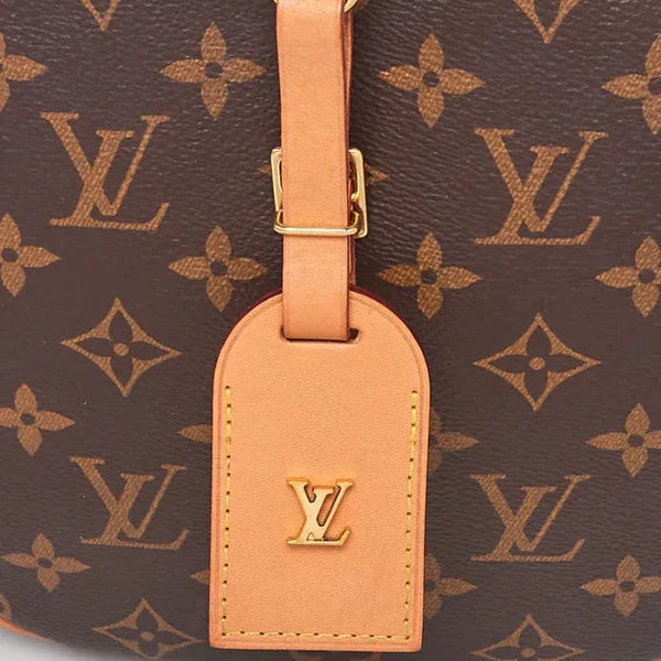 Louis Vuitton Boîte Chapeau Souple MM bag in Monogram Canvas & Gold Hardware
