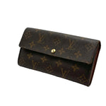 Load image into Gallery viewer, Louis Vuitton Sarah wallet in brown monogram canvas (Pre-owned)
