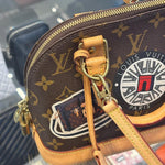 Load image into Gallery viewer, Louis Vuitton Limited Edition Monogram Canvas World Tour Alma BB Bag (Pre-owned)
