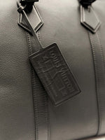 Load image into Gallery viewer, Louis Vuitton Aerogram Lock it Handbag Black (Pre-owned)
