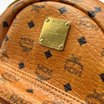 Load image into Gallery viewer, MCM Visetos Side Stud X-Mini Stark Bebe Boo Backpack Cognac (Pre-owned) J39C8QY
