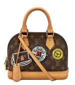 Load image into Gallery viewer, Louis Vuitton Limited Edition Monogram Canvas World Tour Alma BB Bag (Pre-owned)
