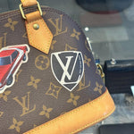 Load image into Gallery viewer, Louis Vuitton Limited Edition Monogram Canvas World Tour Alma BB Bag (Pre-owned)
