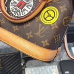 Load image into Gallery viewer, Louis Vuitton Limited Edition Monogram Canvas World Tour Alma BB Bag (Pre-owned)
