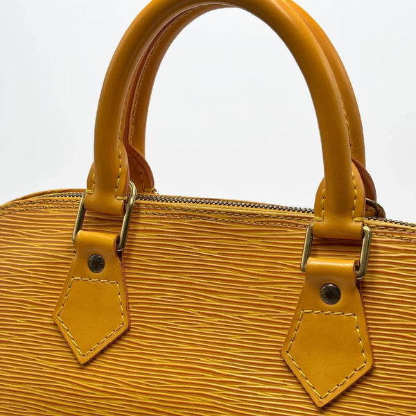 Louis Vuitton 1997 Epi Alma PM handbag Yellow (Pre-owned) TG9J473