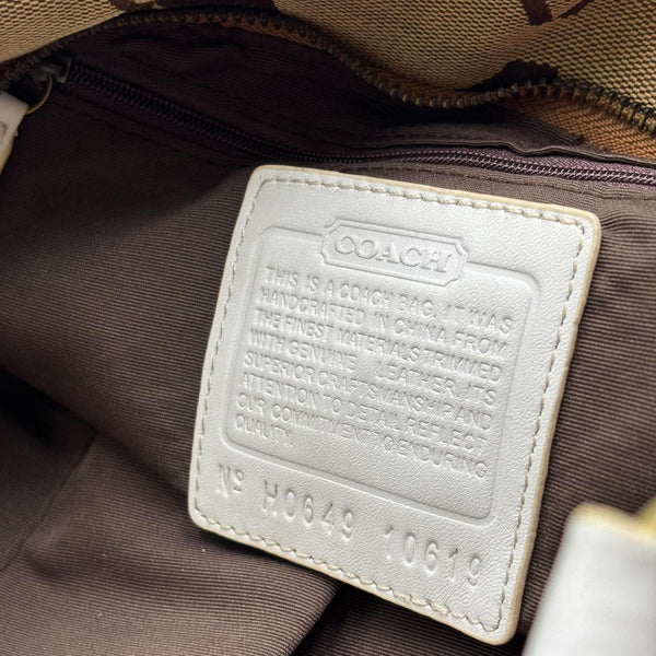 Coach Beige/White Signature Canvas and Leather Carly Hobo (Pre-owned)