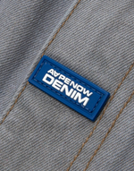 Load image into Gallery viewer, AAPE Moonface patch relaxed denim pants
